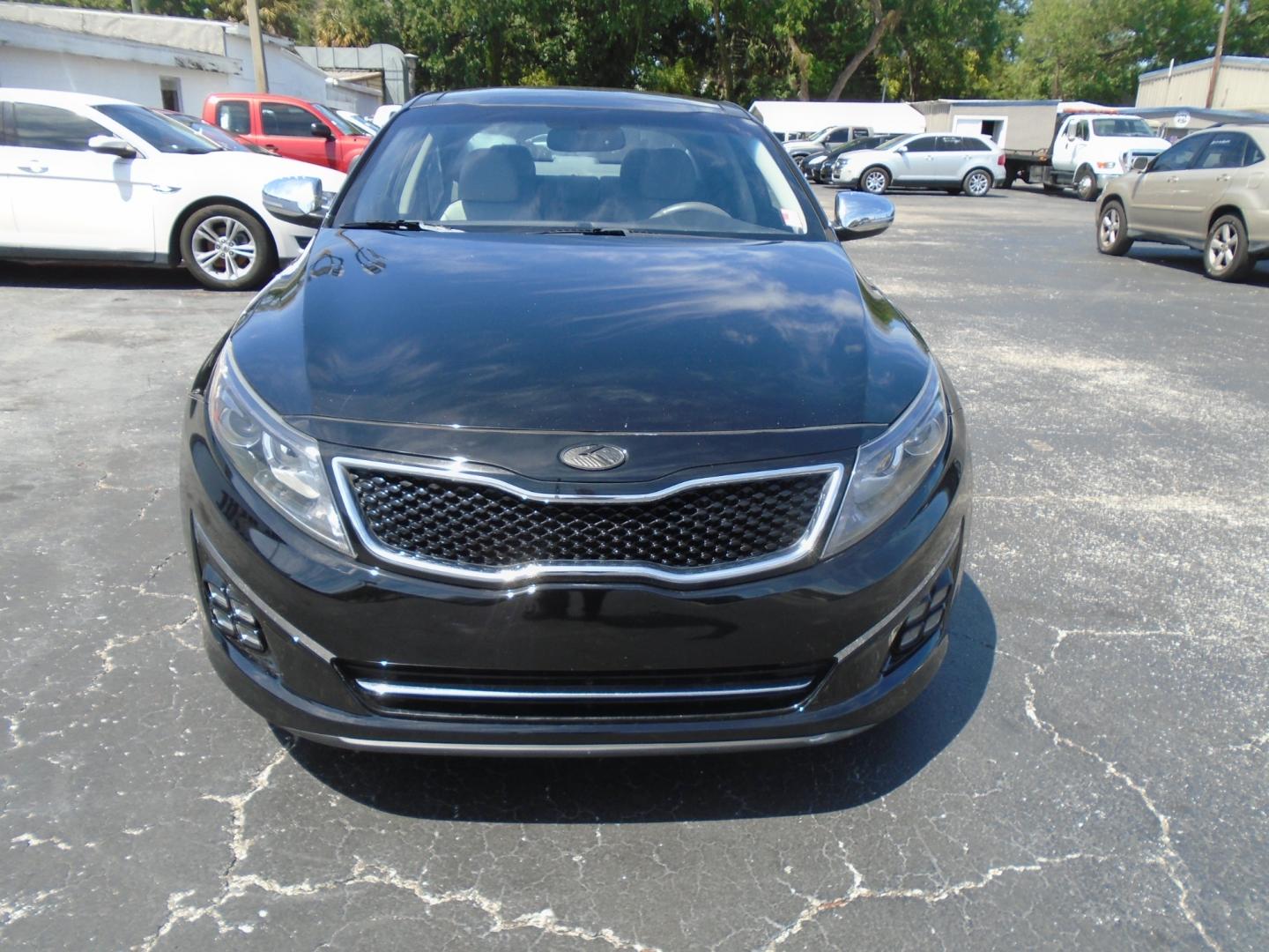 2014 Black /Grey Kia Optima SX Turbo (5XXGR4A68EG) with an 2.0L L4 DOHC 16V TURBO engine, 6-Speed Automatic transmission, located at 6112 N Florida Avenue, Tampa, FL, 33604, (888) 521-5131, 27.954929, -82.459534 - Photo#1